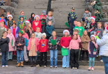 Young voices ring out at Historic Crook County Courthouse with holiday caroling